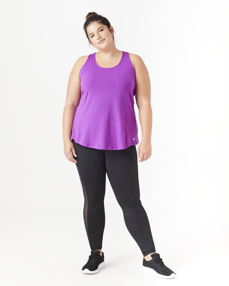 Plus size model with hourglass body shape wearing Danica Mesh-Back Tank by Rainbeau Curves | Dia&Co | dia_product_style_image_id:141097